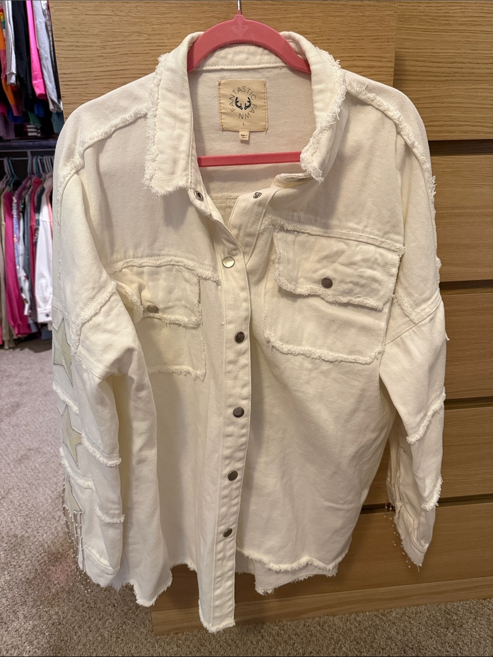 Fantastic Fawn white shacket with sequin stars and tassels